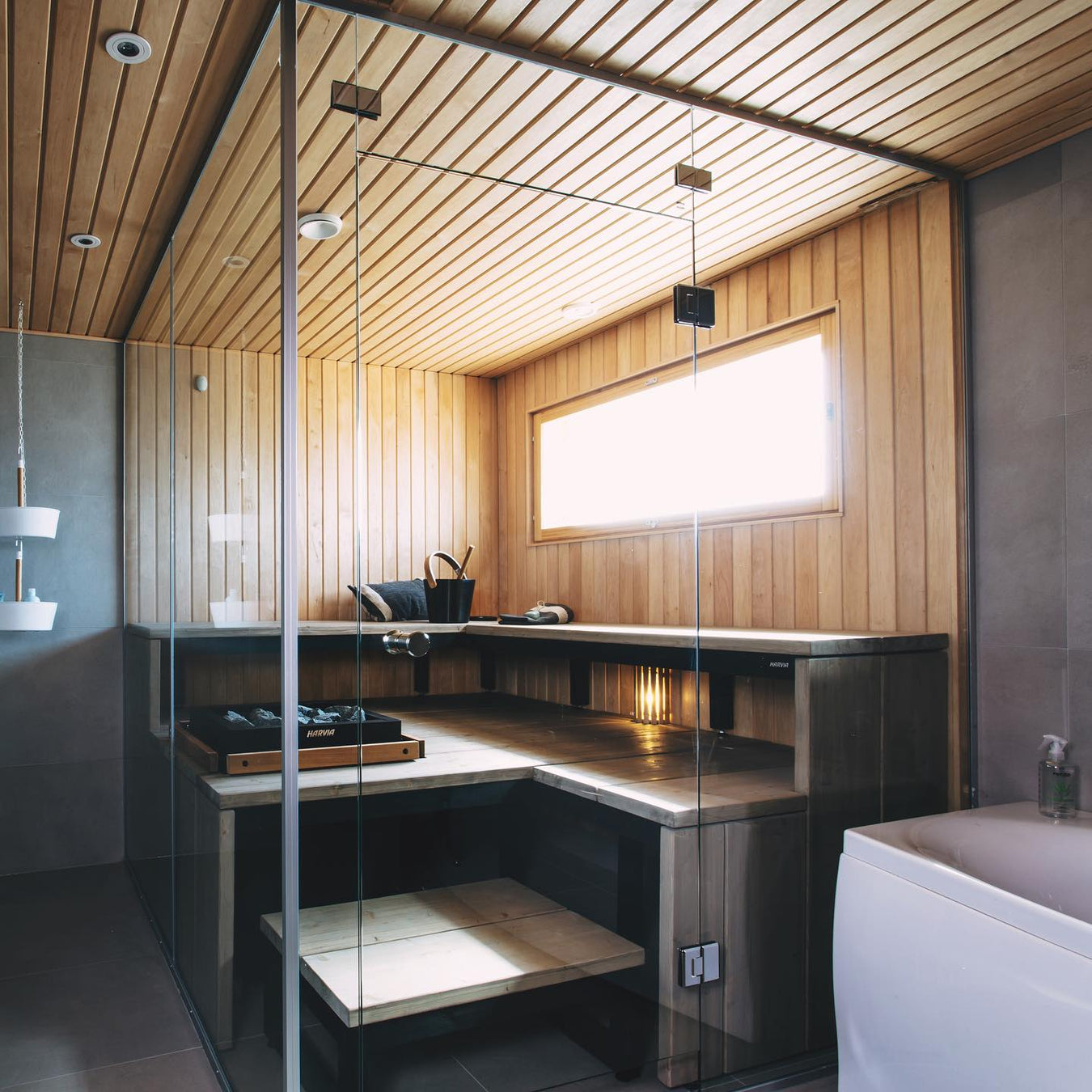 Custom Bathroom Sauna Build With Glass Walls and Large Window