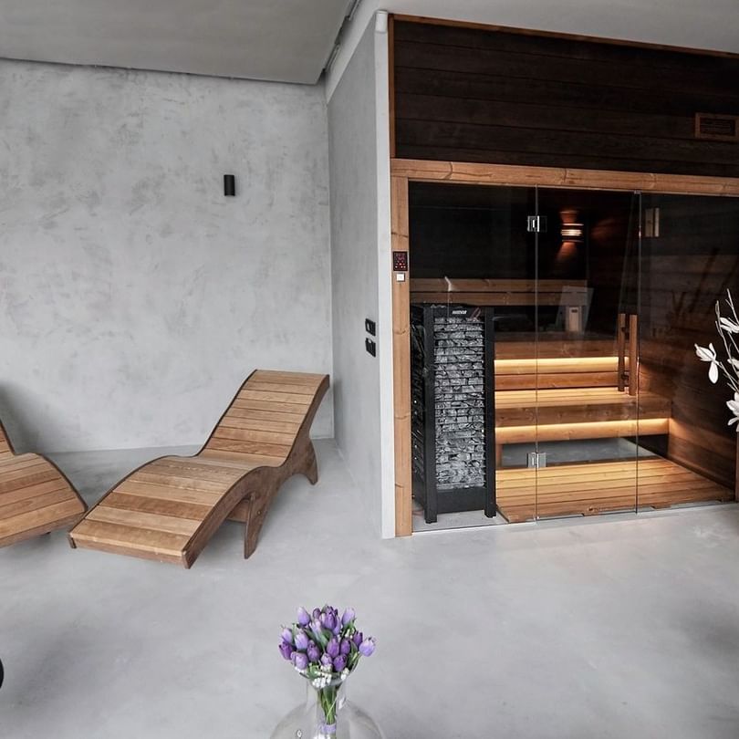 Custom Corner Sauna Dark Design in Concrete Room