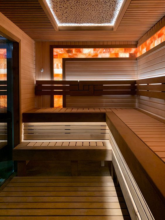 Custom Sauna With Himalayan Salt Feature and Contrasting Benches