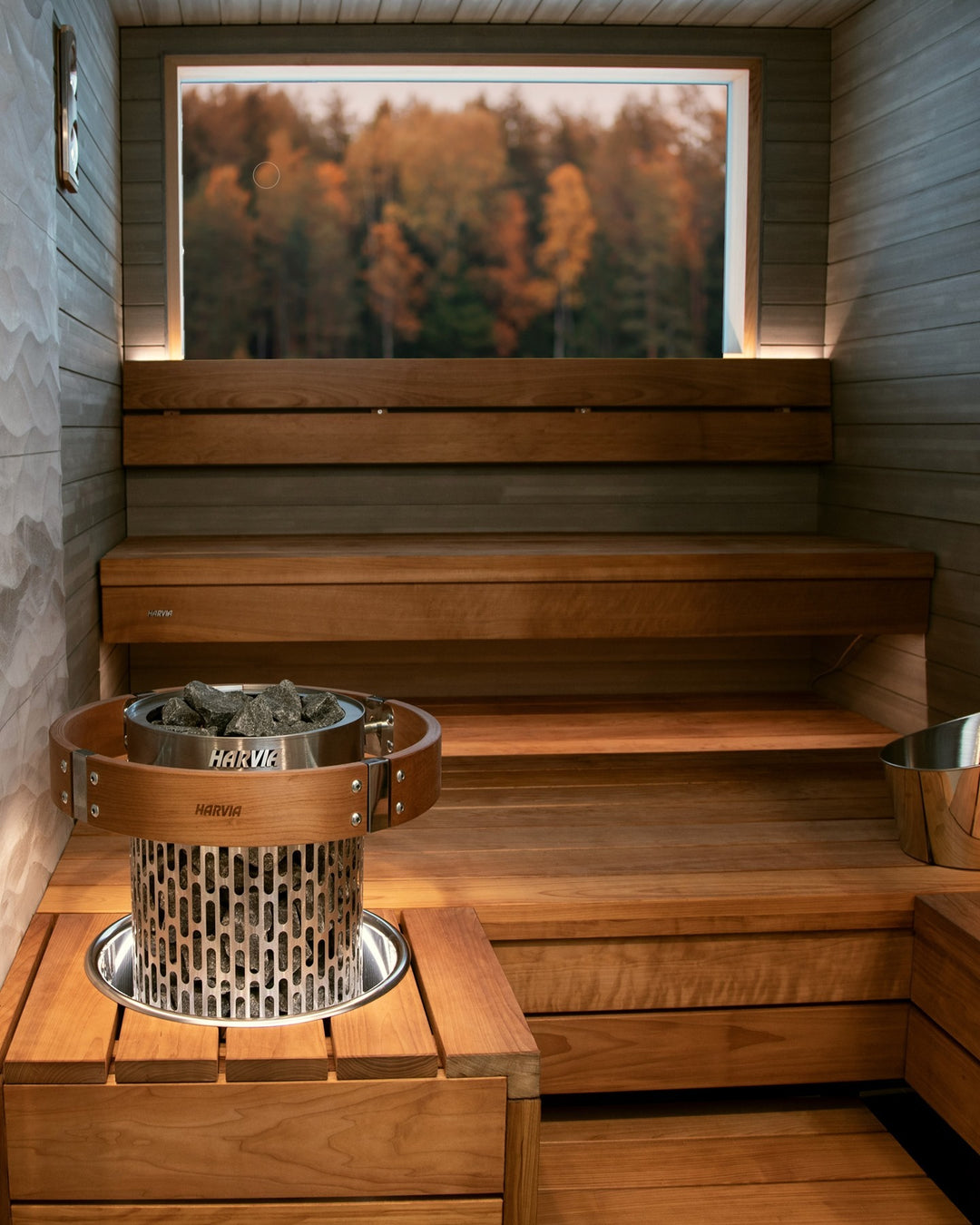 Custom Sauna with Harvia Cilindro Embedded and Raises Benches