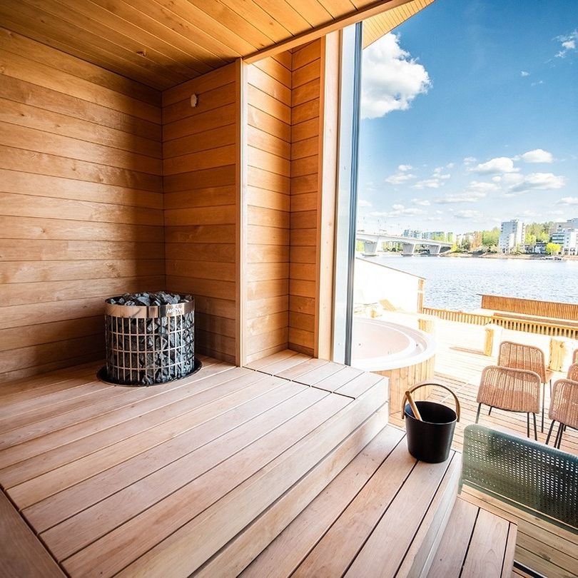 
Outdoor Sauna With Pretty View and Corner Round Heater
