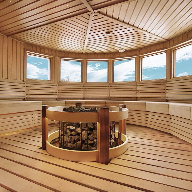 Round Custom Sauna inside a Lighthouse With Center Heater