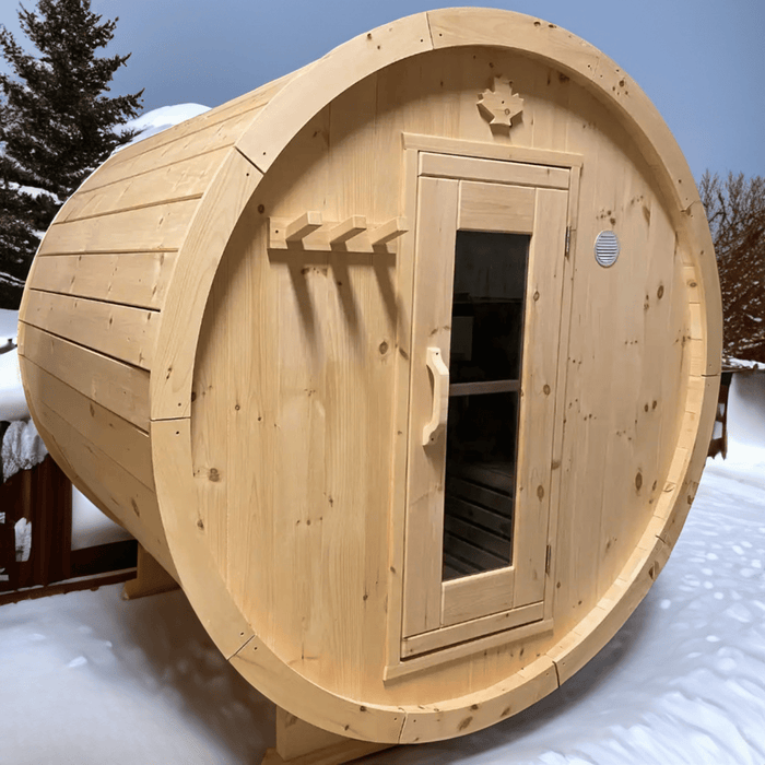 True north cedar barrel sauna in snowy terrain