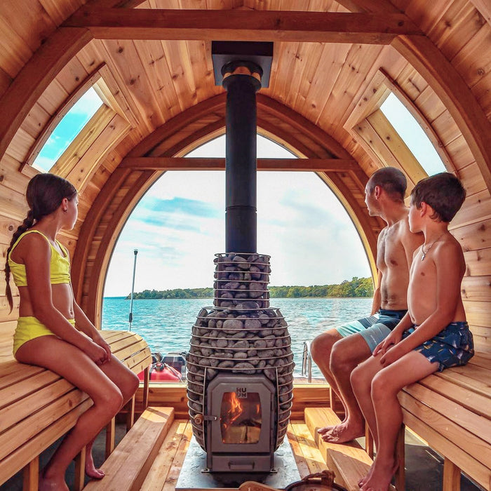 Paquete de estufa de leña para sauna HUUM HIVE de 17 kW con chimenea a través del techo y protección de piedras y piso